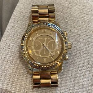 Gold MK watch